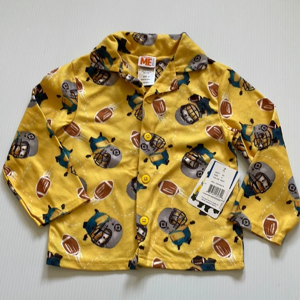Minions yellow football pajama top & bottoms.  Size 4